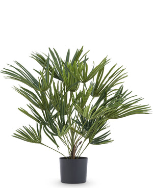 Kunstplant met grote palmbladeren in pot