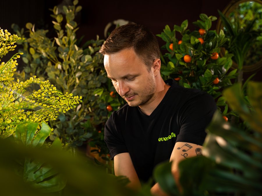 The NeverLeafs team among the artificial plants